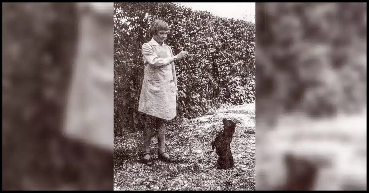 My mom as a young girl with a dog.