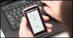 Two factor code being displayed on a mobile device.