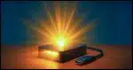 A glowing external hard drive sits on a desk, with beams of light shining out as if it holds hidden treasure.