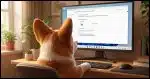 Ann over-the-shoulder view of a Corgi in a home office sits in front of a Windows PC with an extra large screen displaying the BitLocker configuration screen.