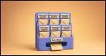 A mail sorter/organizer with multiple labeled slots, each representing different disposable addresses, with one main slot catching all the sorted mail